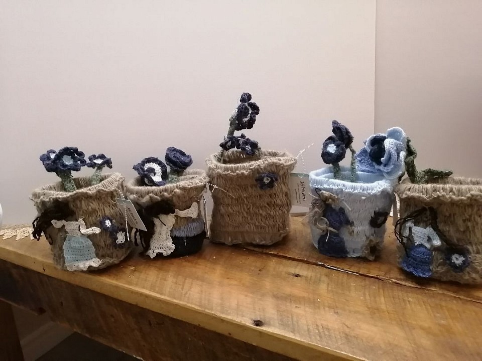 Crochet decorated storage baskets